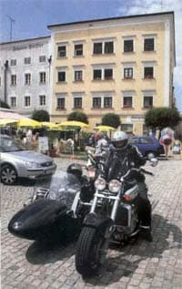 Tour members Edwin & Joy Winet on thier sidecar in Europe